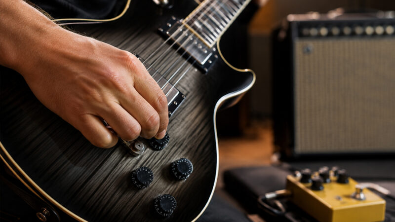 Por que grandes guitarristas não deixam o volume da guitarra sempre no 10